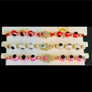 3 Evil eye string bracelets red, white and pink